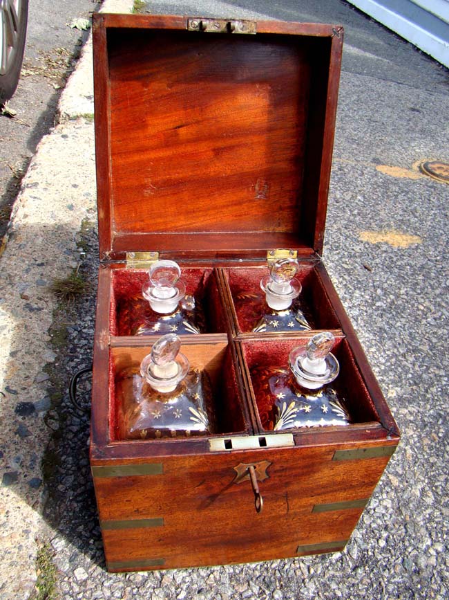 A beautiful early 19th century Ship Captain's decanter set with its' original bottles circa 1820